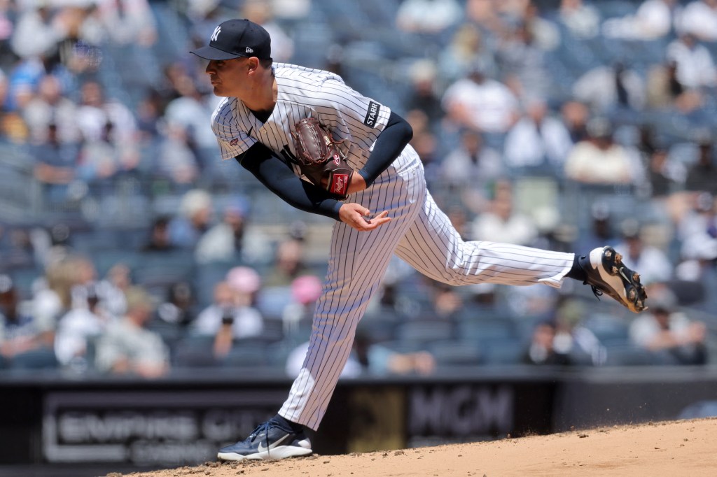 New York Yankees pitcher Brendan Beck throwing a pitch against the Texas Rangers.