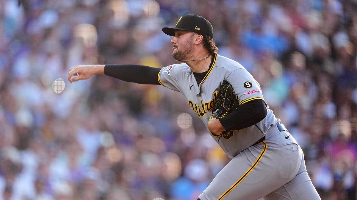 Paul Skenes pitching for the Pittsburgh Pirates against the Colorado Rockies in Denver