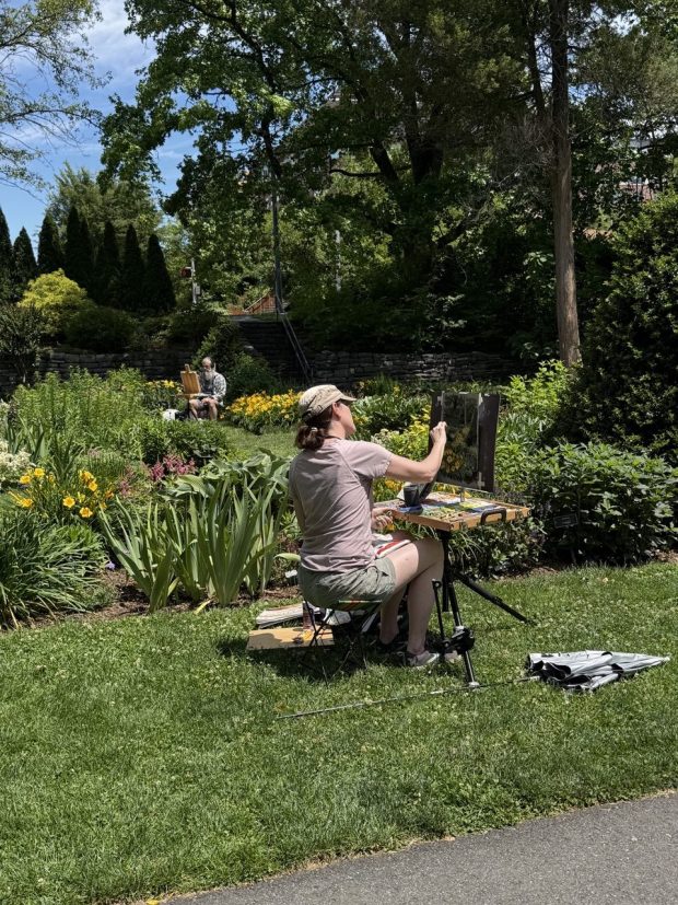 Erin Pryor Gill of Bethlehem works on her third-place-winning pastel painting, "Perennial Garden, Reading Arboretum," during the Quick Draw event at the Reading Public Museum on June 15. (Courtesy of Plein Air West Reading)