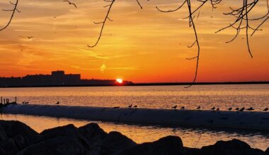 The sun sets over Lake Erie in Edgewater, Ohio. (Spectrum News 1/Lydia Taylor)