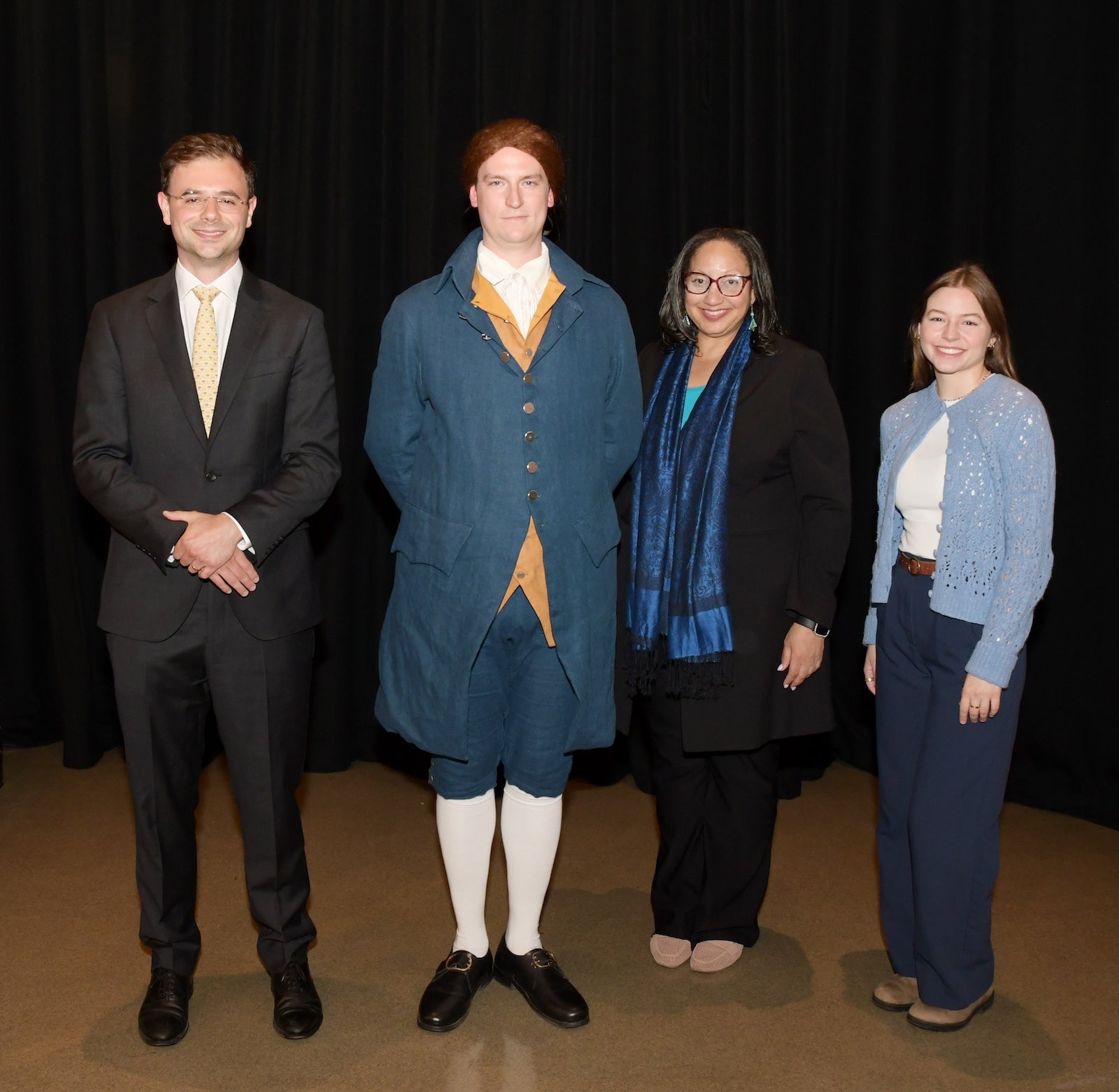 From left: Peter Jakob Olsen-Harbich, Sarah Glover and Amanda Moore appear with Caleb Tracy, from Historic Philadelphia, Inc., portraying Thomas Jefferson.