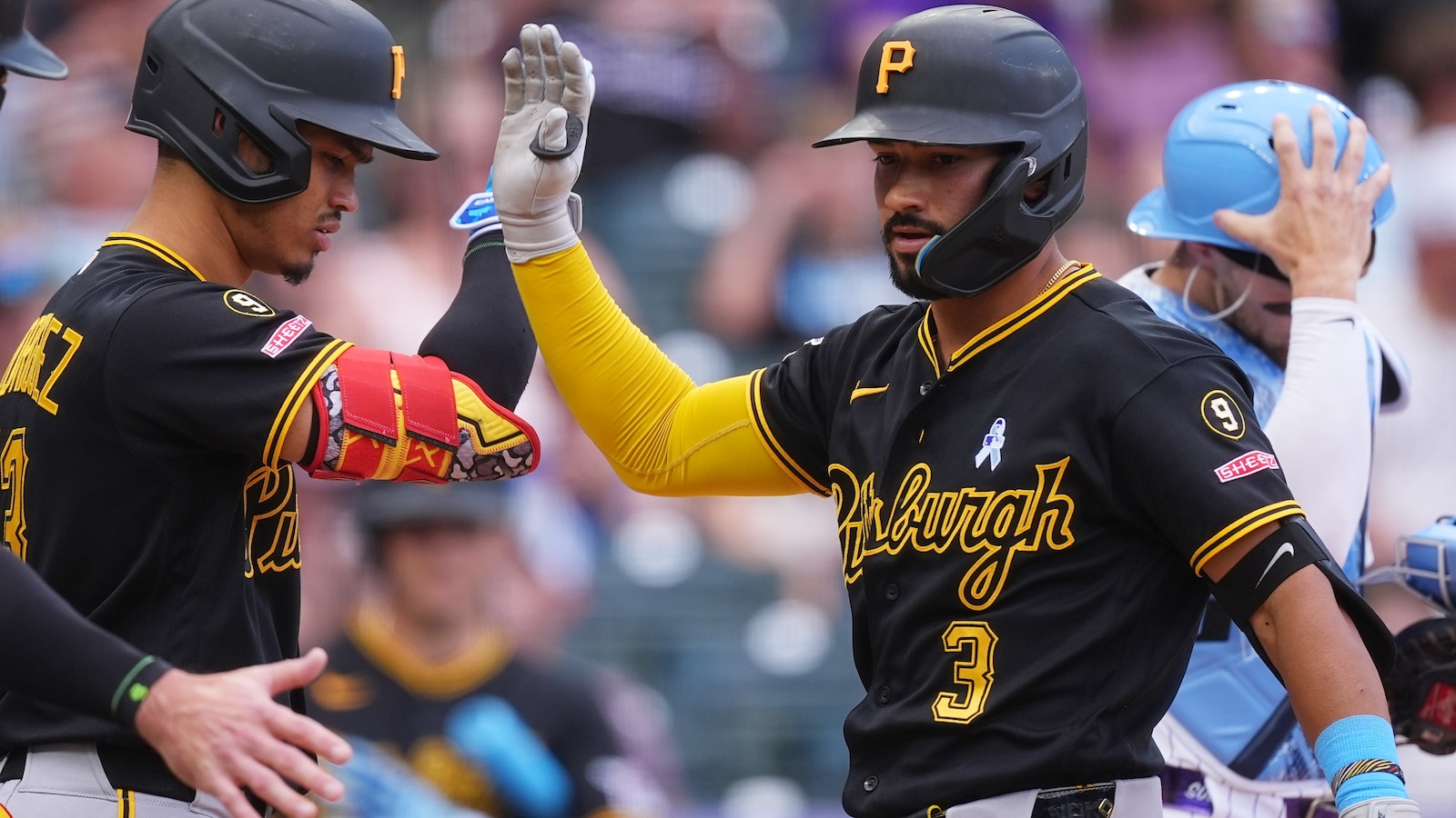 Gonzalez and Reynolds homer as the Pirates hold off the Rockies 8-6
