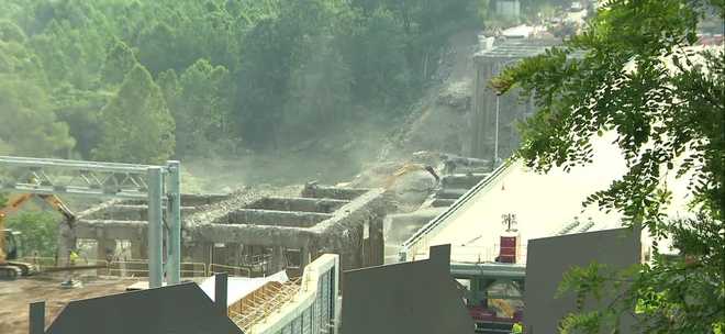 The Commercial Street Bridge along the Parkway East in the Pittsburgh area was demolished early Thursday morning in a controlled explosion, with PennDOT officials calling the operation "perfectly executed". the commercial street bridge along the parkway east in the pittsburgh area was demolished early thursday morning in a controlled explosion, with penndot officials calling the operation "perfectly executed".