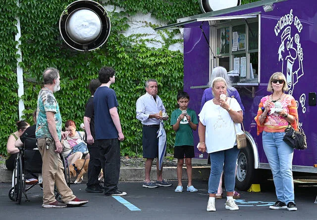 <p>What’s the Scoop trailer served ice cream treats to a steady line of customers at the 2nd Friday Art Walk, Pittston.</p>
<p>Tony Callaio | For Sunday Dispatch</p>