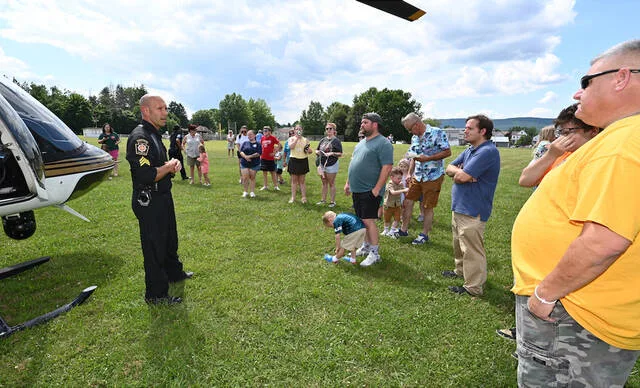 <p>Pennsylvania State Police helicopter pilot Sgt. Donald Marsh spoke to attendees at the Hughestown Blue, Red & You Festival about flying for the State Police and the helicopter.</p>
<p>Tony Callaio | For Sunday Dispatch</p>