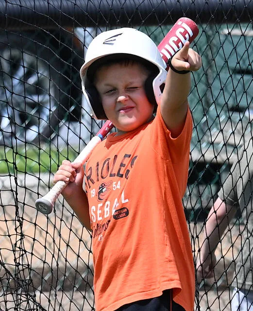 <p>Camper eight-year-old Grayson Donovan boldly points to where he wants to hit a home run.</p>
<p>Tony Callaio | For Sunday Dispatch</p>