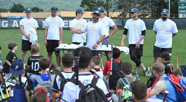<p>Wyoming Area baseball varsity Head Coach Rob Lemoncelli, center, prepares to close out the 9th annual Warrior baseball camp at the Brozell Atlas Field.</p>
<p>Tony Callaio | For Sunday Dispatch</p>