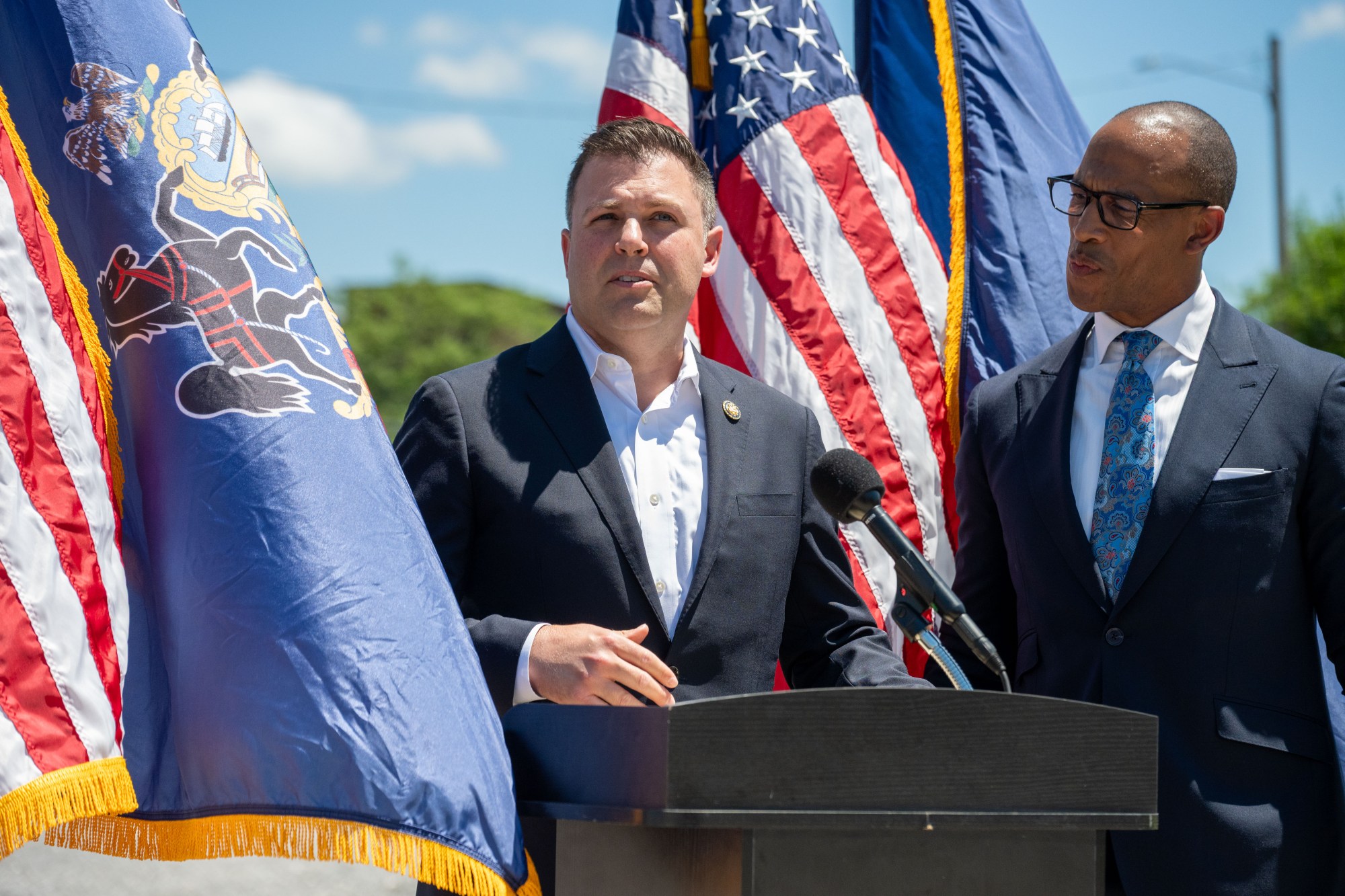 U.S. Rep. Ryan Mackenzie, R-7th, left, and U.S. Housing and Urban Development Secretary Scott Turner visit Adams Street on Wednesday, July 8, 2026, in Bethlehem. Turner was in the area to discuss HUD programs involving opportunity zones, housing affordability and community investment. (Jonathan Broady/Special to The Morning Call)