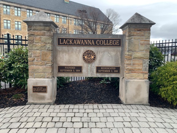 A Lackawanna College sign at Vine Street and Adams Avenue in Scranton on April 1, 2026. (JIM LOCKWOOD / STAFF PHOTO)