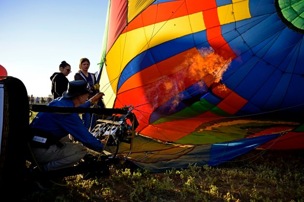 Pilot David Bowling ignites the burners to inflate The Wind...