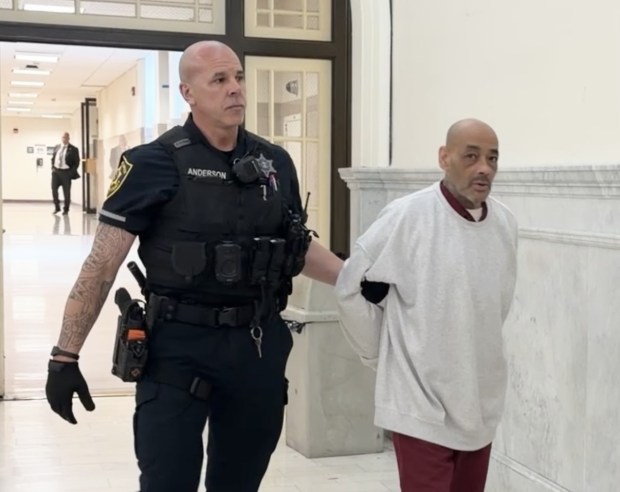 Jose Luna is escorted by a deputy sheriff to a pretrial hearing in Montgomery County Court on July 21, 2026. (Photo by Carl Hessler Jr. - MediaNews Group)
