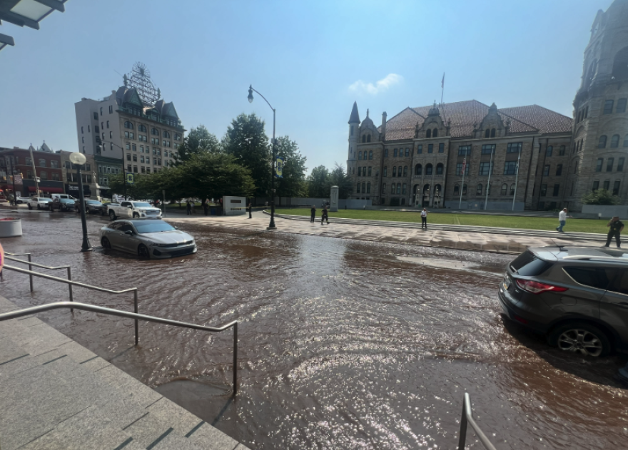 A water main break in downtown Scranton has prompted the closure of several government buildings and led to a boil advisory while crews work to repair the rupture. It also has led to flooding on the North Washington Avenue side of Courthouse Square, as seen here.