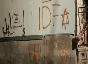 Israeli forces spray racist graffiti on homes in Bethlehem governorate