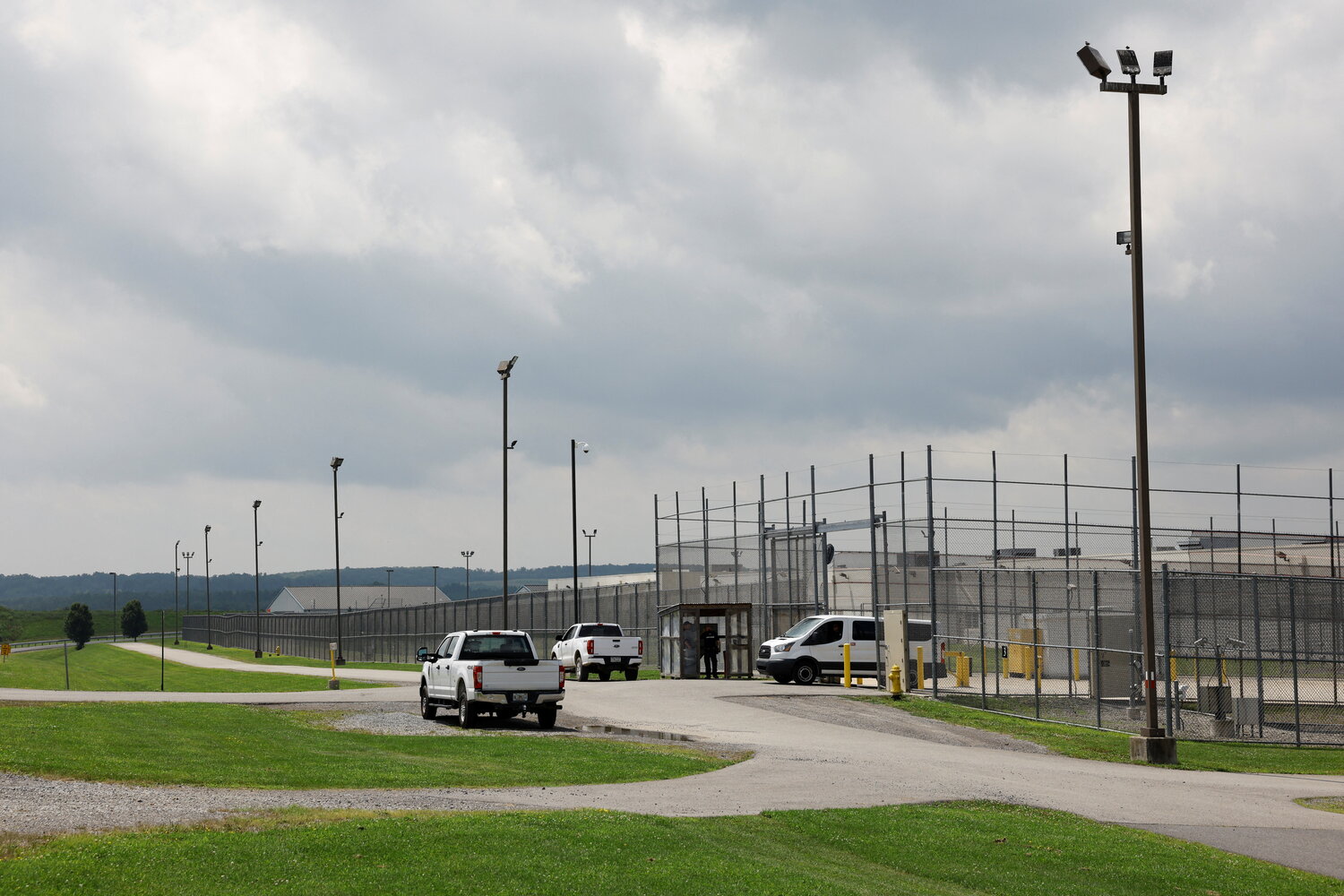 A detainee transport van exits the Moshannon Valley Processing Center, a former prison repurposed as an immigration detention facility under contract with the U.S. Immigration and Customs Enforcement, in Philipsburg, Pennsylvania. Two additional detention centers were planned for Berks and Schuylkill counties, but plans have since been abandoned.