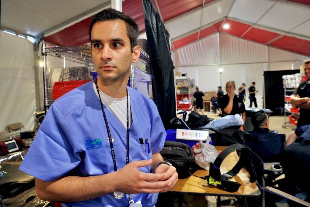 Dr. Jonathan Bar, director of emergency preparedness at Penn Medicine, prepares for a day in the medical services tent at FIFA Fan Fest at Lemon Hill