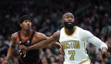 Boston Celtics forward Jaylen Brown (7) boxes out Philadelphia 76ers guard VJ Edgecombe (77) during the first half at TD Garden.