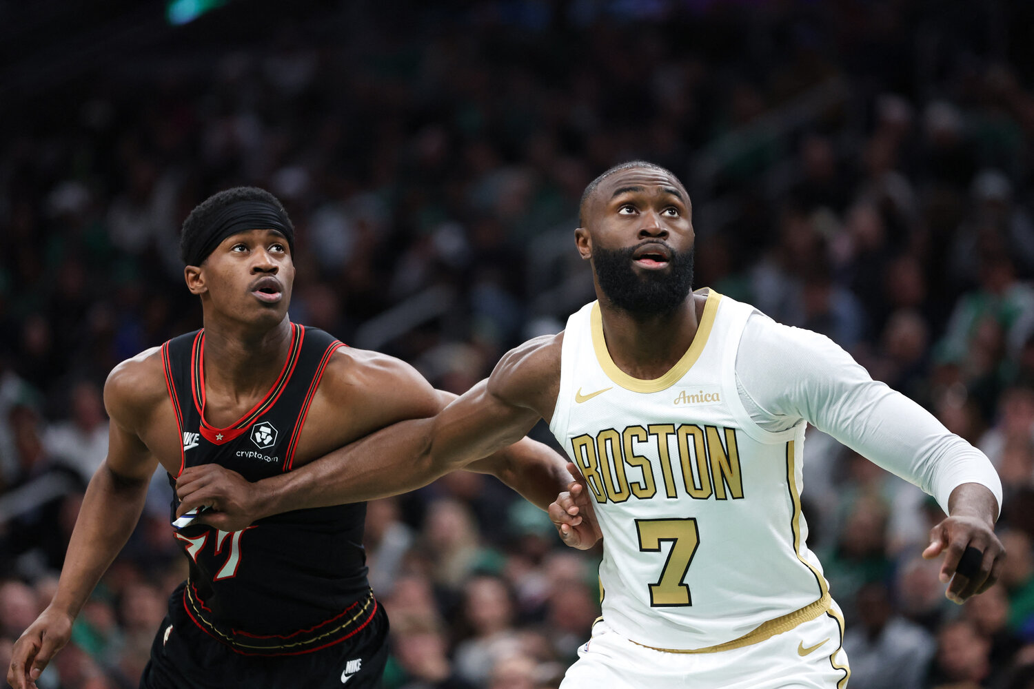 Boston Celtics forward Jaylen Brown (7) boxes out Philadelphia 76ers guard VJ Edgecombe (77) during the first half at TD Garden.