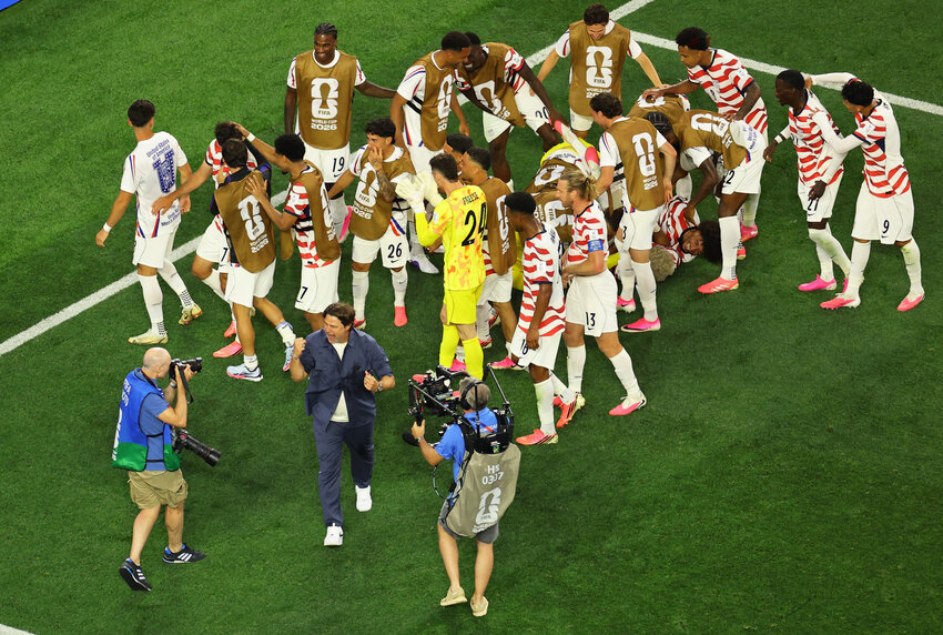 Giovanni Reyna of the U.S. celebrates scoring their fourth goal with teammates and coach Mauricio Pochettino
