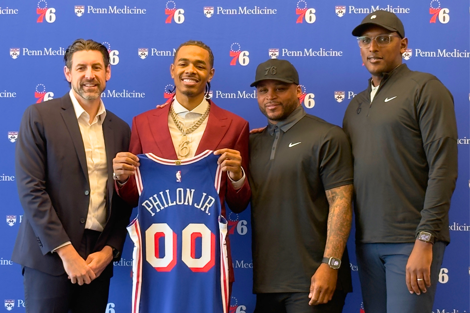 Sixers president Mike Gansey with first round draft pick Labaron Philon Jr., executive vice president Jameer Nelson, and assistant general manager Prosper Karangwa pose during an introductory press conference at the Philadelphia 76ers Training Complex.