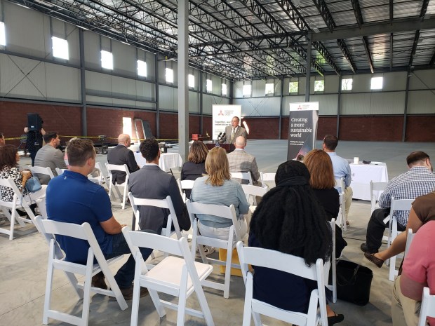 Mayor Eddie Moran addresses those gathered in a building under construction at Mitsubishi Chemical Advanced Materials, 2120 Fairmont Ave. The company is expanding its Reading operation with a more than $20 million investment (MICHELLE LYNCH?READING EAGLE)
