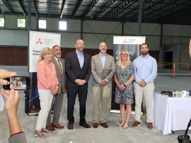 State Sen. Judy Schwank; Mayor Eddie Moran; Rick Siger, secretary of the state Department of Community and Economic Development; Daniel Barish, general manager of Mitsubishi Chemical's engineered shapes and solutions division; state Rep. Jacklyn Rusnock; and Bryan Robinson, technical sales manager for Mitsubishi Chemical Advanced Materials, during an event announcing a $20 million expansion of the company's facility in the Northmont section of Reading. (MICHELLE LYNCH/READING EAGLE)