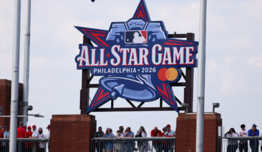 Fans stand under a 2026 All Star Game sign during a game between the Philadelphia Phillies and the Texas Rangers at Citizens Bank Park.