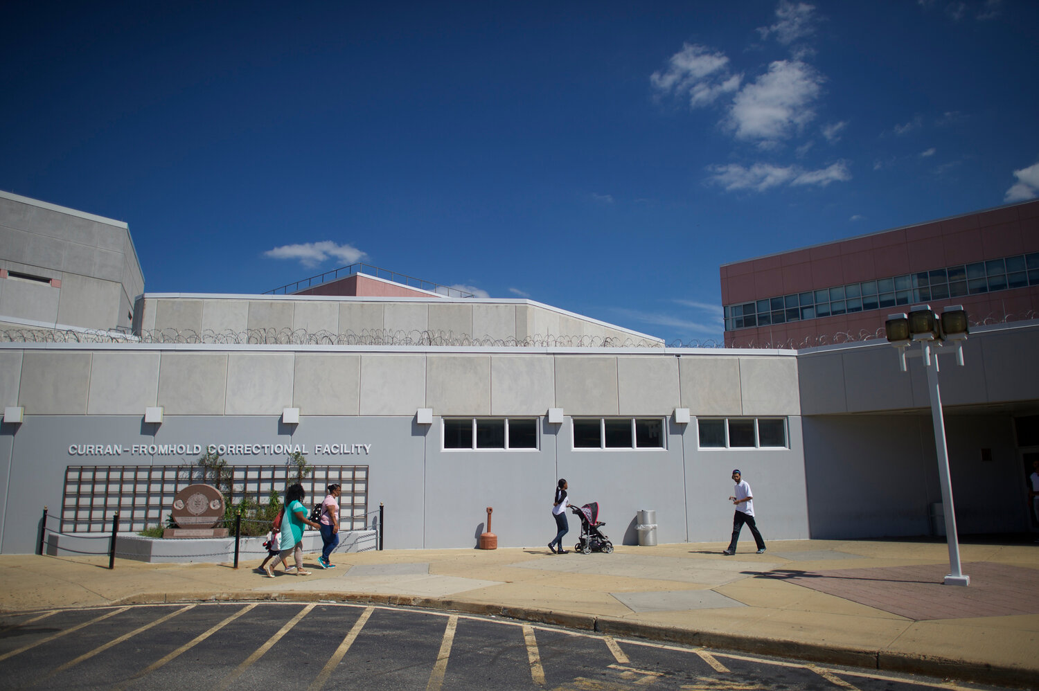 Visitors arrive and depart Curran-Fromhold Correctional Facility in Philadelphia.