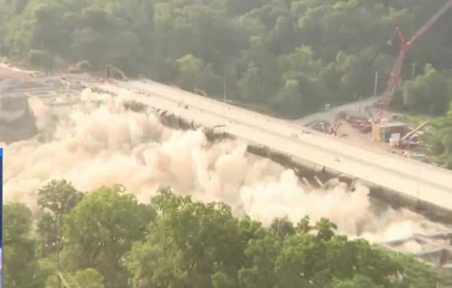 The Commercial Street Bridge along the Parkway East in the Pittsburgh area was demolished early Thursday morning in a controlled explosion, with PennDOT officials calling the operation "perfectly executed". the commercial street bridge along the parkway east in the pittsburgh area was demolished early thursday morning in a controlled explosion, with penndot officials calling the operation "perfectly executed".