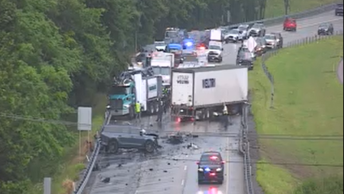 SUV driver killed after tractor-trailer crosses over I-279 median