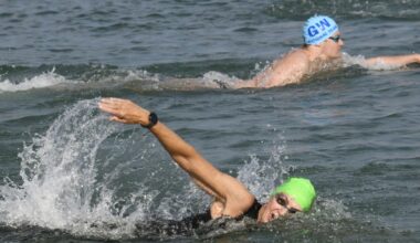 Swimmers tackle mile swim in Lake Erie in honor of longtime instructor | Sports