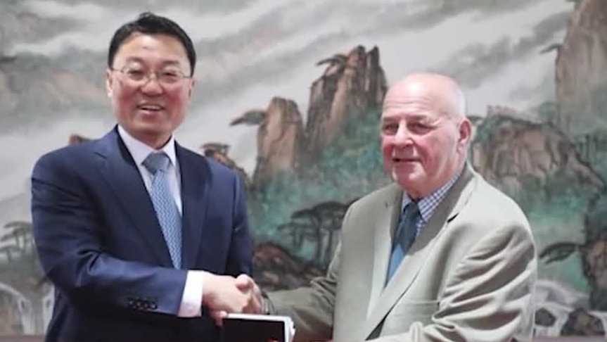 Retired Pennsylvania teacher honored for helping transform desert in China into forest