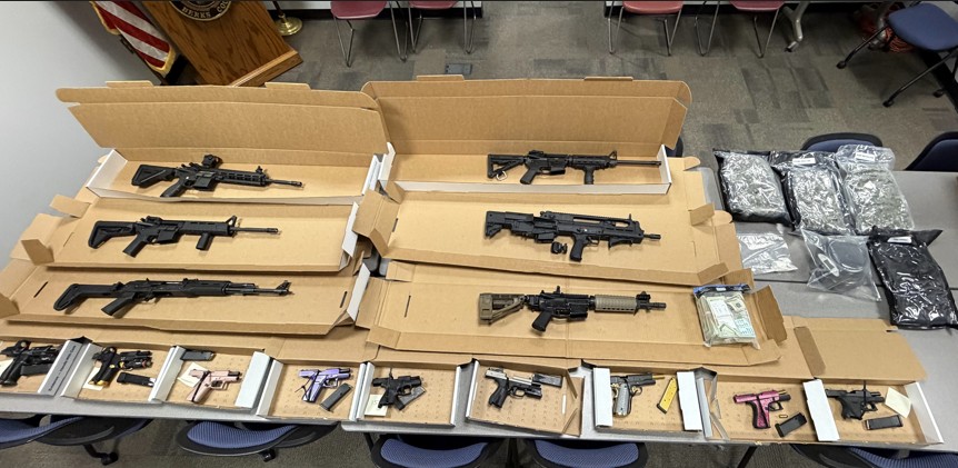 4 pounds of marijuana, 15 firearms, $37,000 seized in raid on Berks home