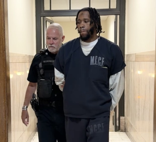 Quron Carter is escorted by a deputy sheriff to his sentencing hearing in Montgomery County Court. (Photo by Carl Hessler Jr. - MediaNews Group)