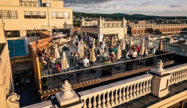 Rooftop crowd enjoying skyline views above downtown at The Roof at Oppenheim in Scranton, PA.