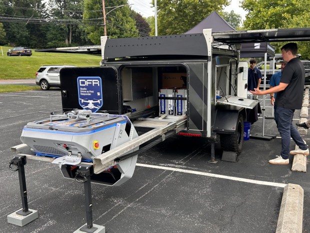 Skydio drone sales representative Elliot Long prepares to launch a drone in the Upper Chichester police station parking lot. (PETE BANNAN-DAILY TIMES)