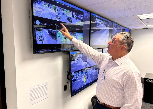 Upper Darby Police Superintendent Timothy Bernhardt points out public surveillance cameras in the township that are monitored in the real time crime center. (PETE BANNAN-DAILY TIMES)