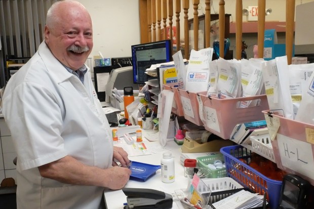 Heights Terrace Pharmacy John Keegan fills a prescription at the pharmacy on Friday June 26, 2026.(John Haeger / Staff Photographer)
