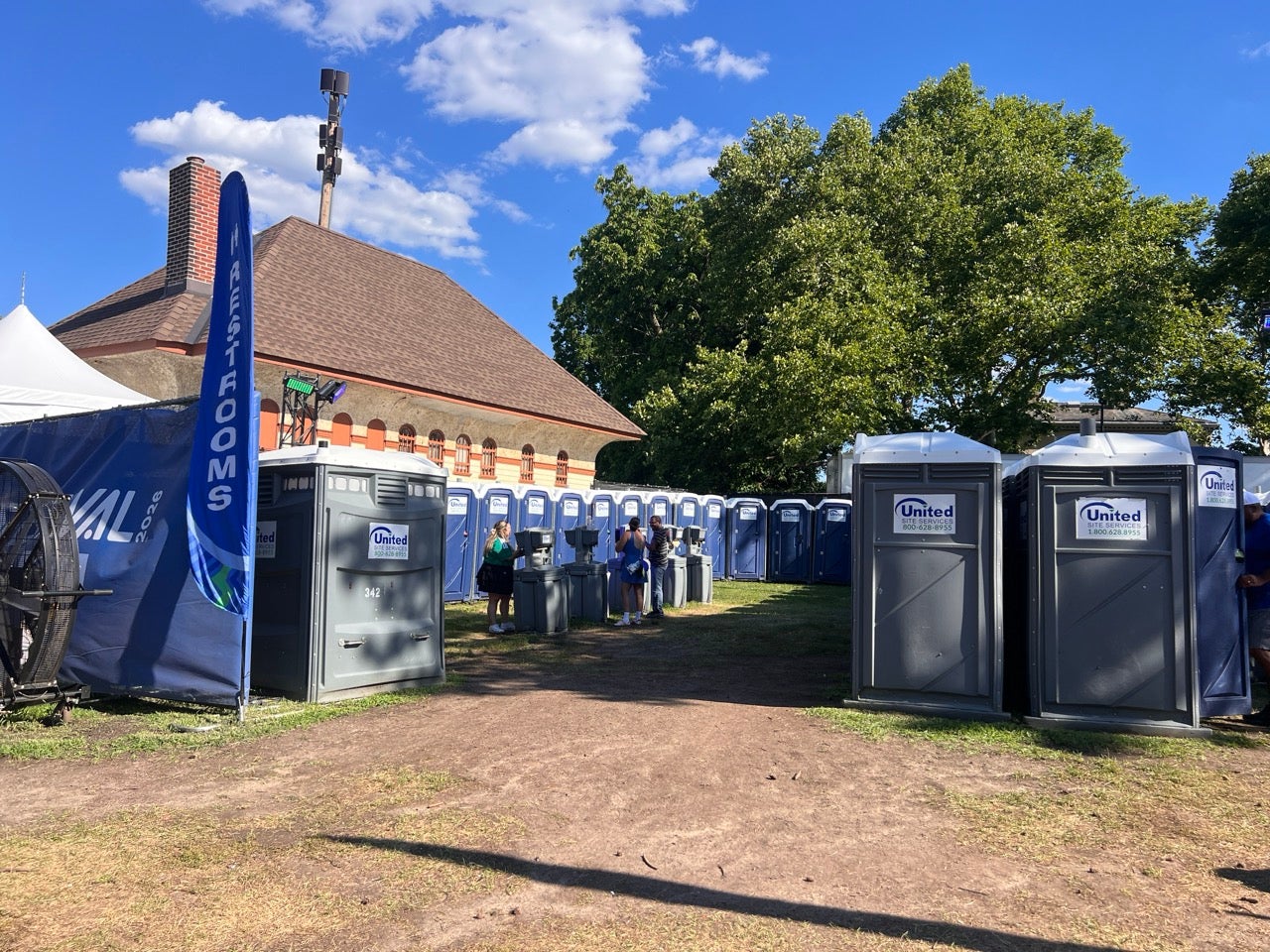 The bathrooms. A line of Porta Potties at the FIFA Fan Festival.