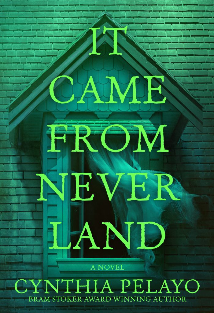 Book cover for It Came From Never Land by Cynthia Pelayo. Green text overlays an eerie, glowing window with ghostly mist or a spirit emerging against a brick wall background.