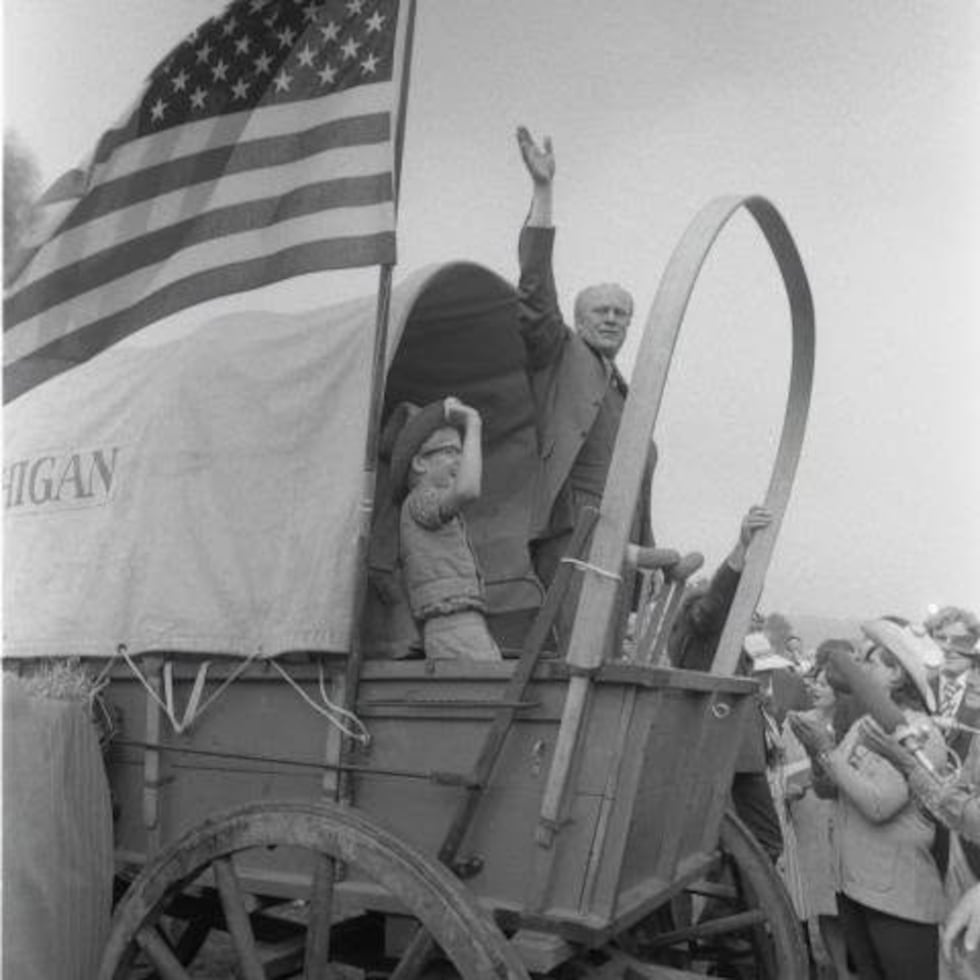 President Gerald Rudolph Ford Jr. waving from a Michigan wagon