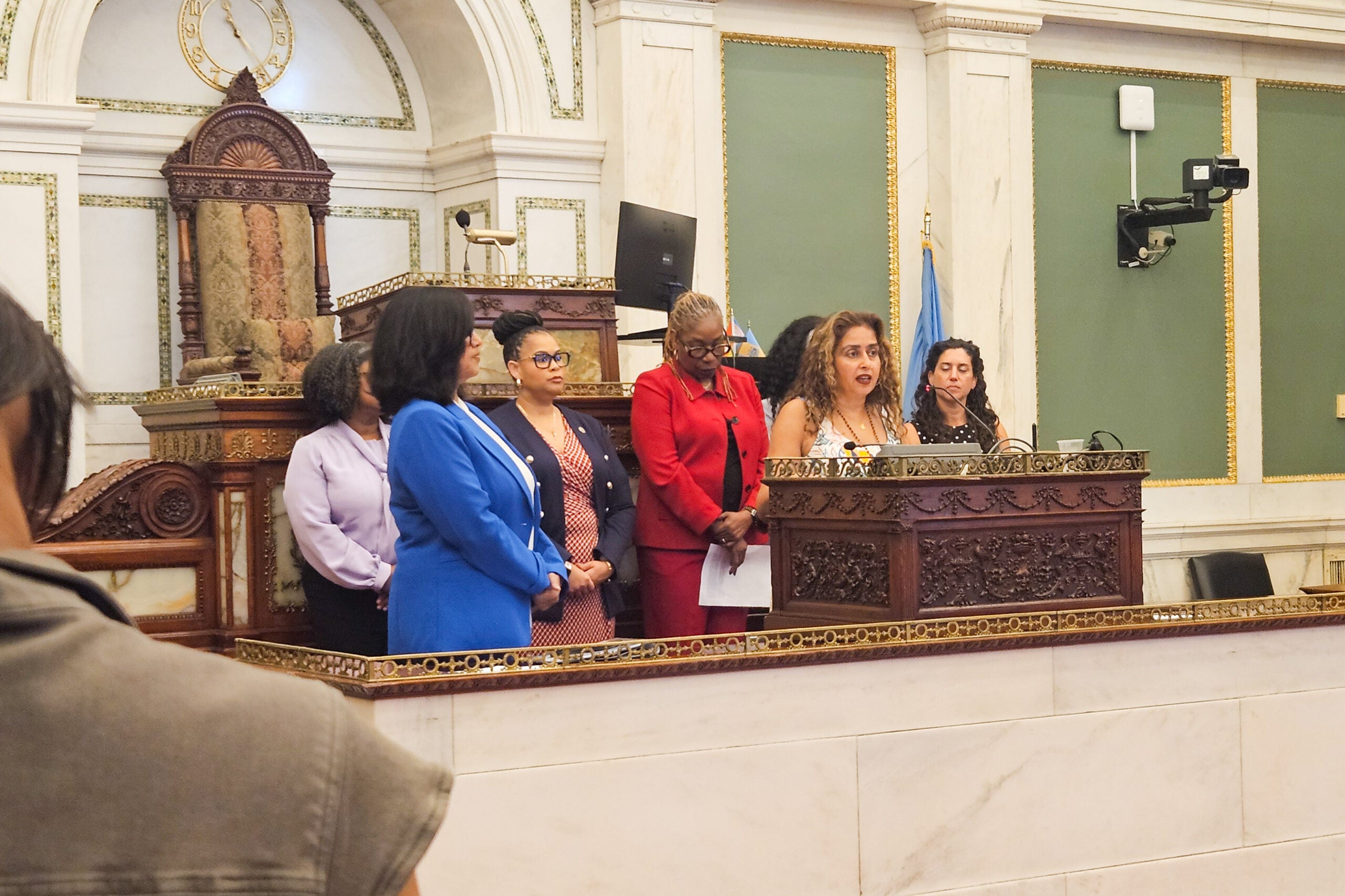 City officials and nonprofit leaders in City Hall