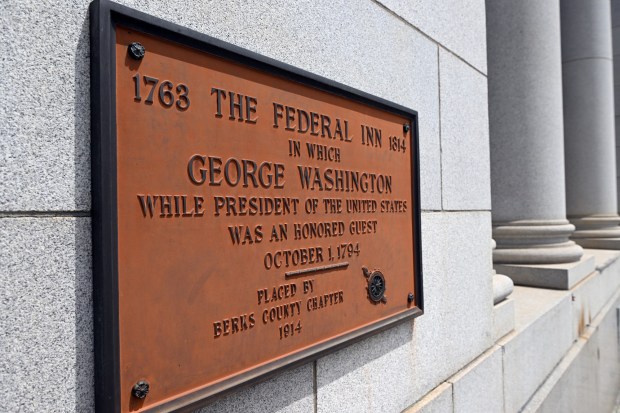 A plaque at Fifth and Penn streets indicates that George Washington slept at the Federal Inn on Oct. 1, 1794, on his way to suppress the Whiskey Rebellion. (BILL UHRICH/READING EAGLE)