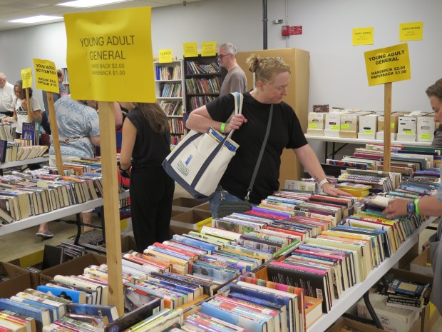 Antietam Junior-Senior High School literature teacher Kimberly Patterson was looking to add to her classroom library during the opening day of the 2026 Berks Book Bonanza on Wednesday. (DAVID MEKEEL - READING EAGLE)