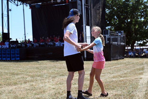 Siblings Bennett, 15, and Louisa, 9, Mocdydlowski of Mohnton dance to the Let's Dance orchestra during the Berks County Star Spangled Spectacular at the county fairgrounds in Bern Township on Saturday, July 4, 2026. (BILL UHRICH/READING EAGLE)