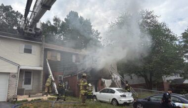 Exeter neighbor credited with rescuing trapped occupants before firefighters arrived