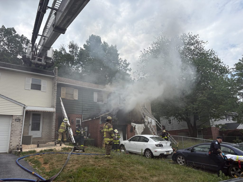 Exeter neighbor credited with rescuing trapped occupants before firefighters arrived