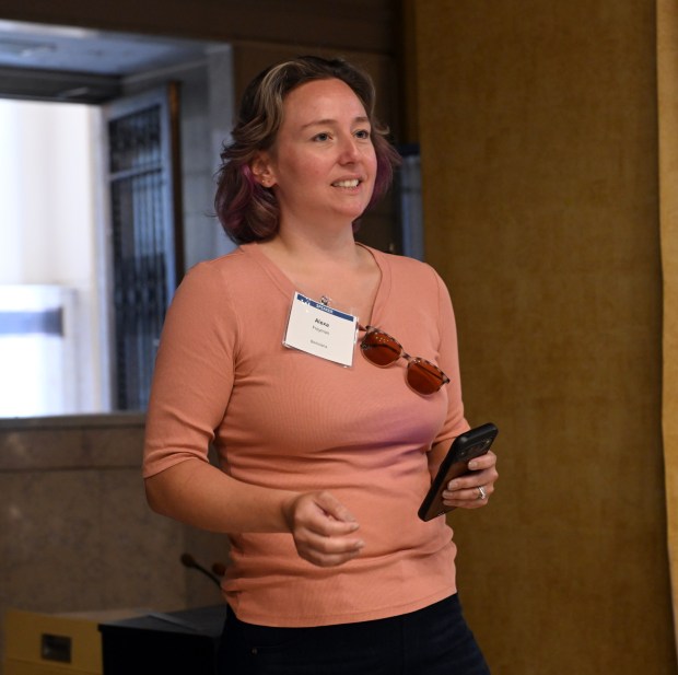 Berks historian Alexa Freyman offers some historical perspective during a tour of the former Farmers Bank at Fifth and Penn streets by the Green Building Alliance. (BILL UHRICH/READING EAGLE)