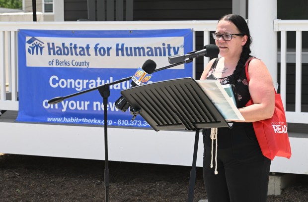 New homeowner Jackie Kull thanks those who helped her acquire her home during a Habitat for Humanity house dedication in the 400 block of Miltimore Street on Monday, June 29, 2026. (BILL UHRICH/READING EAGLE)
