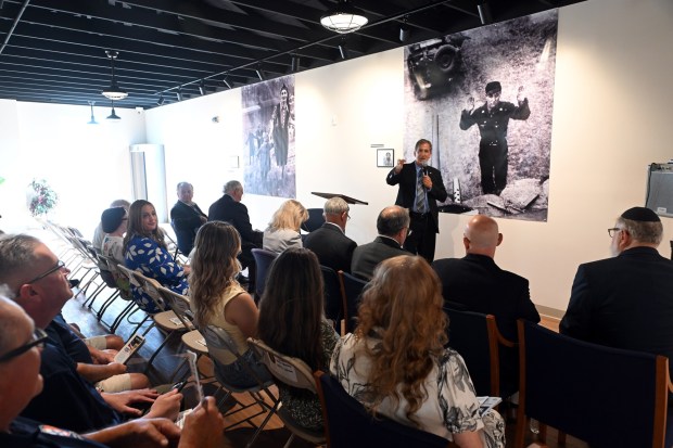State Rep. Mark Gillen, president of museum, greets guests during the dedication of the Berks Holocaust Education Center Museum in Mohnton on Thursday, July 16, 2026. (BILL UHRICH/READING EAGLE)