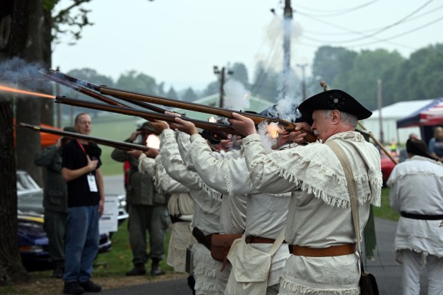 Members of the First Pennsylvania Regiment of the Continental Line fire a volley to open the 46th In-Vette-Tational at the Oley Fire Company Fairgrounds on Saturday, July 18, 2026. (BILL UHRICH/READING EAGLE)